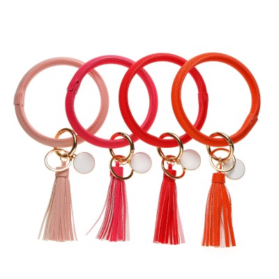 Wholesale leather fringe white drop oil pendant bracelet key chain